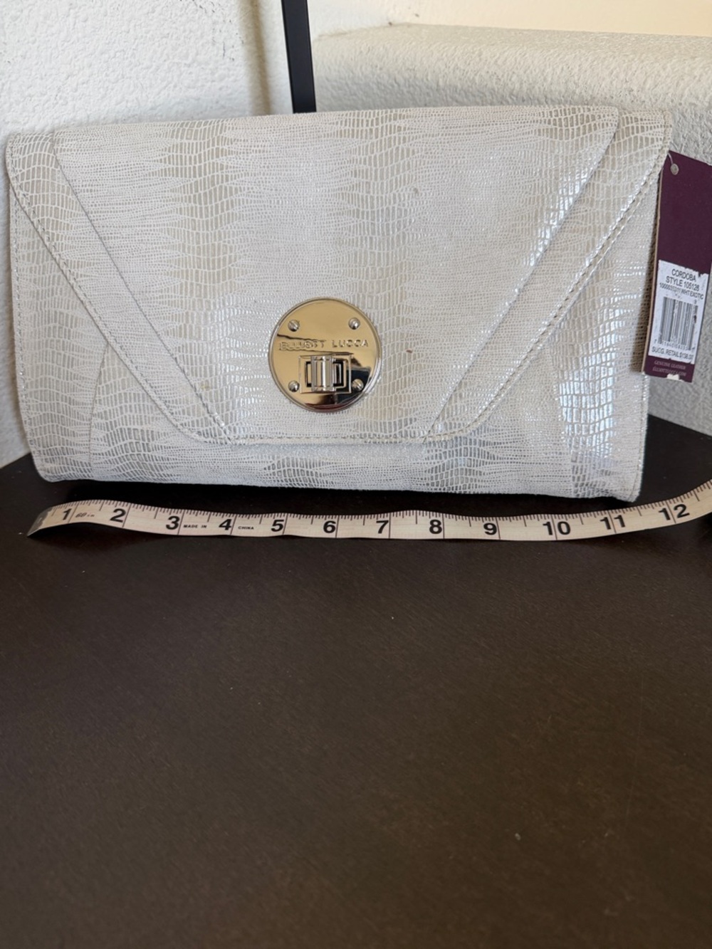 NWT Elliott Lucca white & Silver Embossed Envelope Clutch & Detachable Strap.